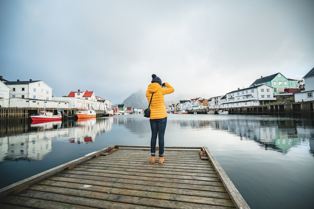Portrait of a young Scandinavian fisherman by the harbour